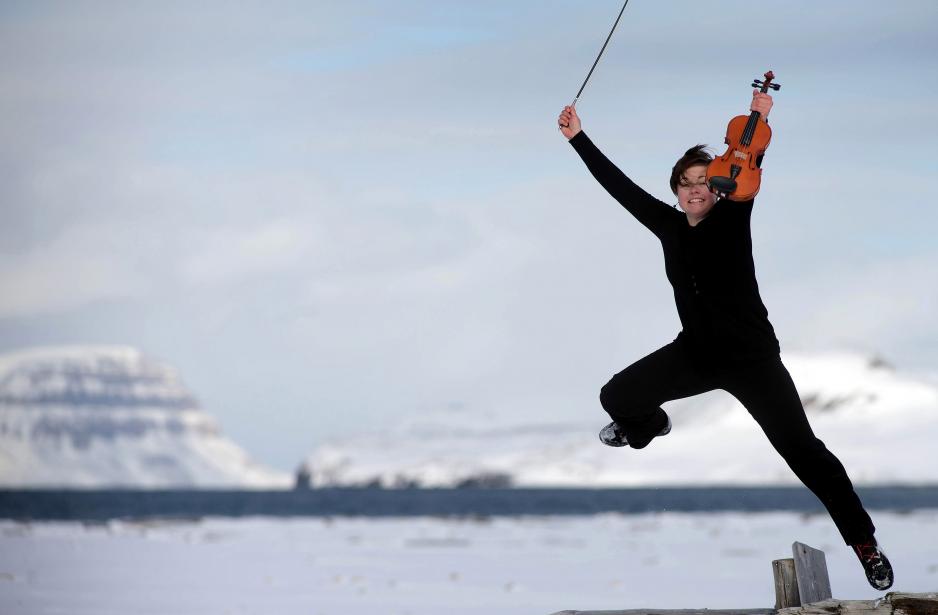 NOSO, the North Norwegian Opera and Symphony Orchestra, at concert, photo shoot and video recording on Svalbard. (Photo: Yngve Olsen Sæbbe)