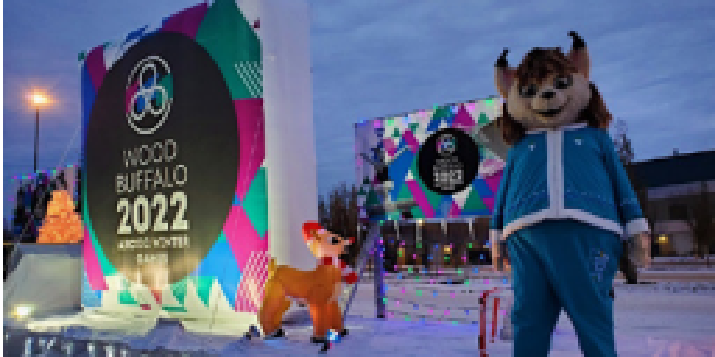 Volunteers make wolf fur pompoms for Yukon's Arctic Winter Games athletes